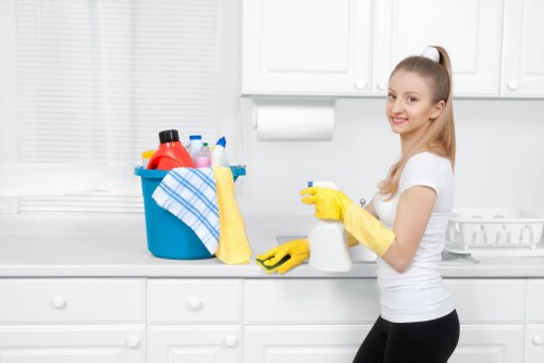 Professional commercial cleaning in an office lobby with polished floors